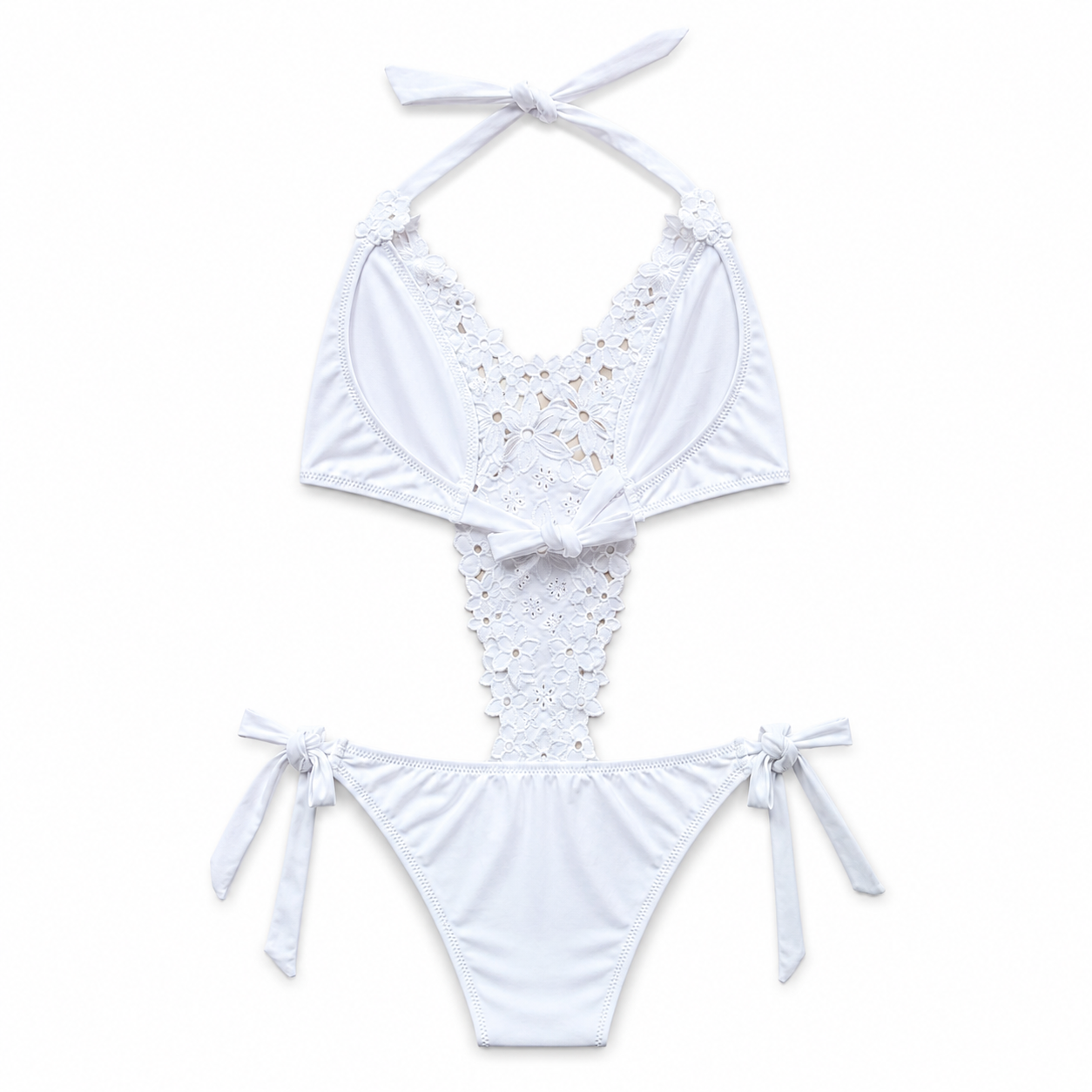 White bikini set with lace details on a white background