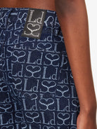 LUDOVIC DE SAINT SERNIN Wide-Leg Logo Branded-Pattern Lace-Up Jeans - House Of Huntington