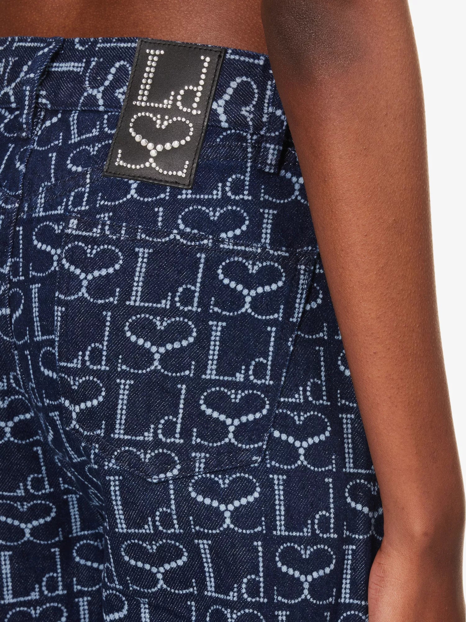 LUDOVIC DE SAINT SERNIN Wide-Leg Logo Branded-Pattern Lace-Up Jeans - House Of Huntington