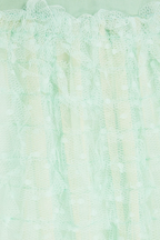 Jupe courte en tulle à volants et dentelle Point d'Esprit vert Red Valentino