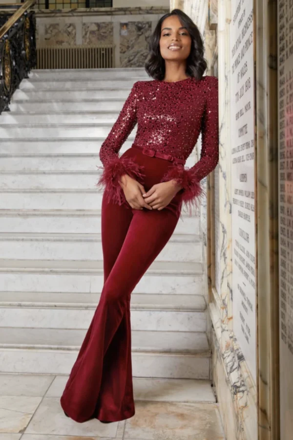 Nadine Merabi Monique Red Embellished Feather Cuff Velvet Flared Leg Jumpsuit - House Of Huntington