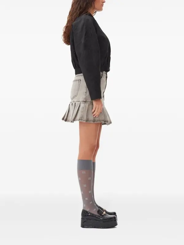 Mini-jupe Ganni grise preppy à ourlet plissé et patch logo
