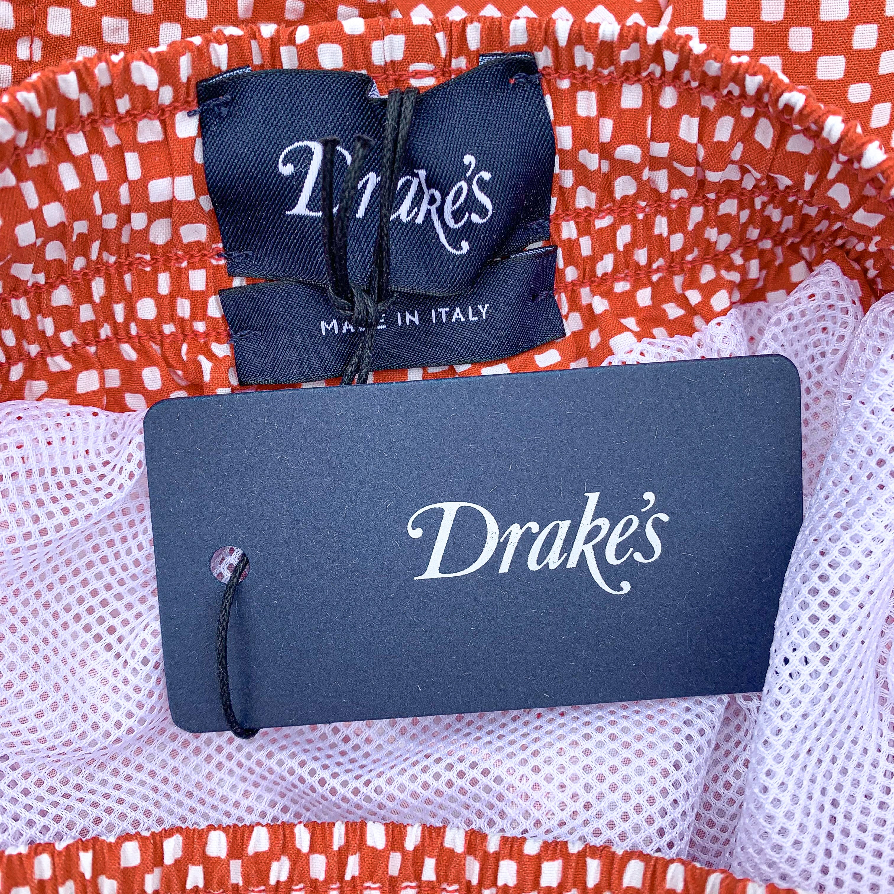 Drake's Coral Pink Swim Shorts In Check Print - House Of Huntington