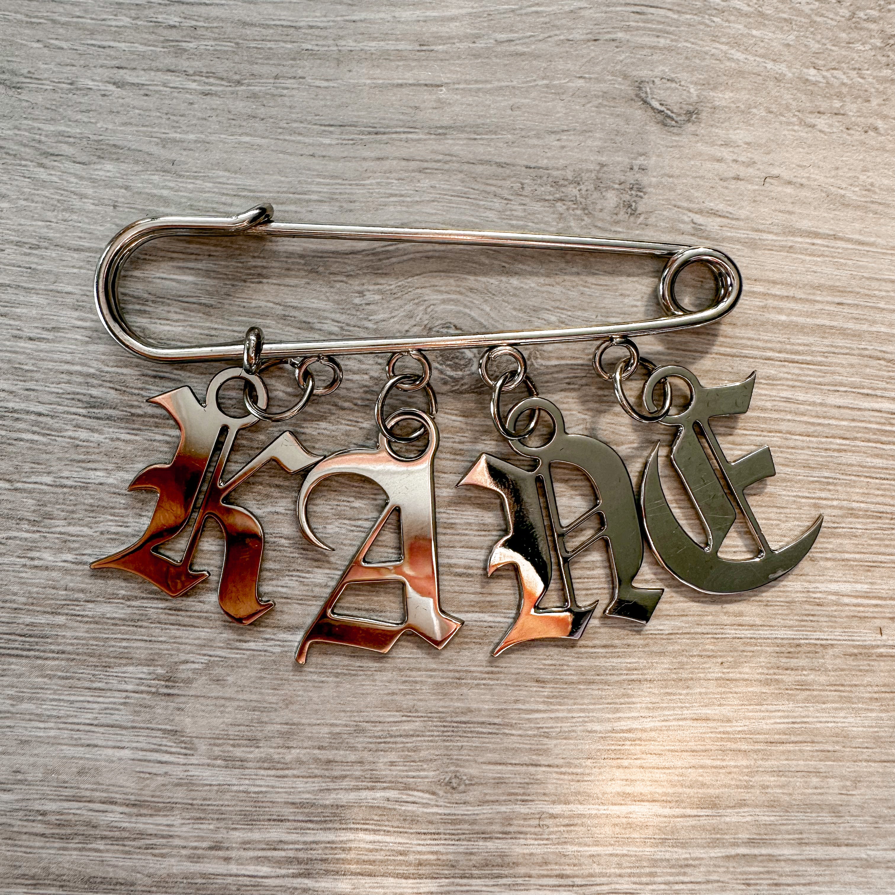 Christopher Kane Name Silver Safety Pin Lapel Pin - House Of Huntington